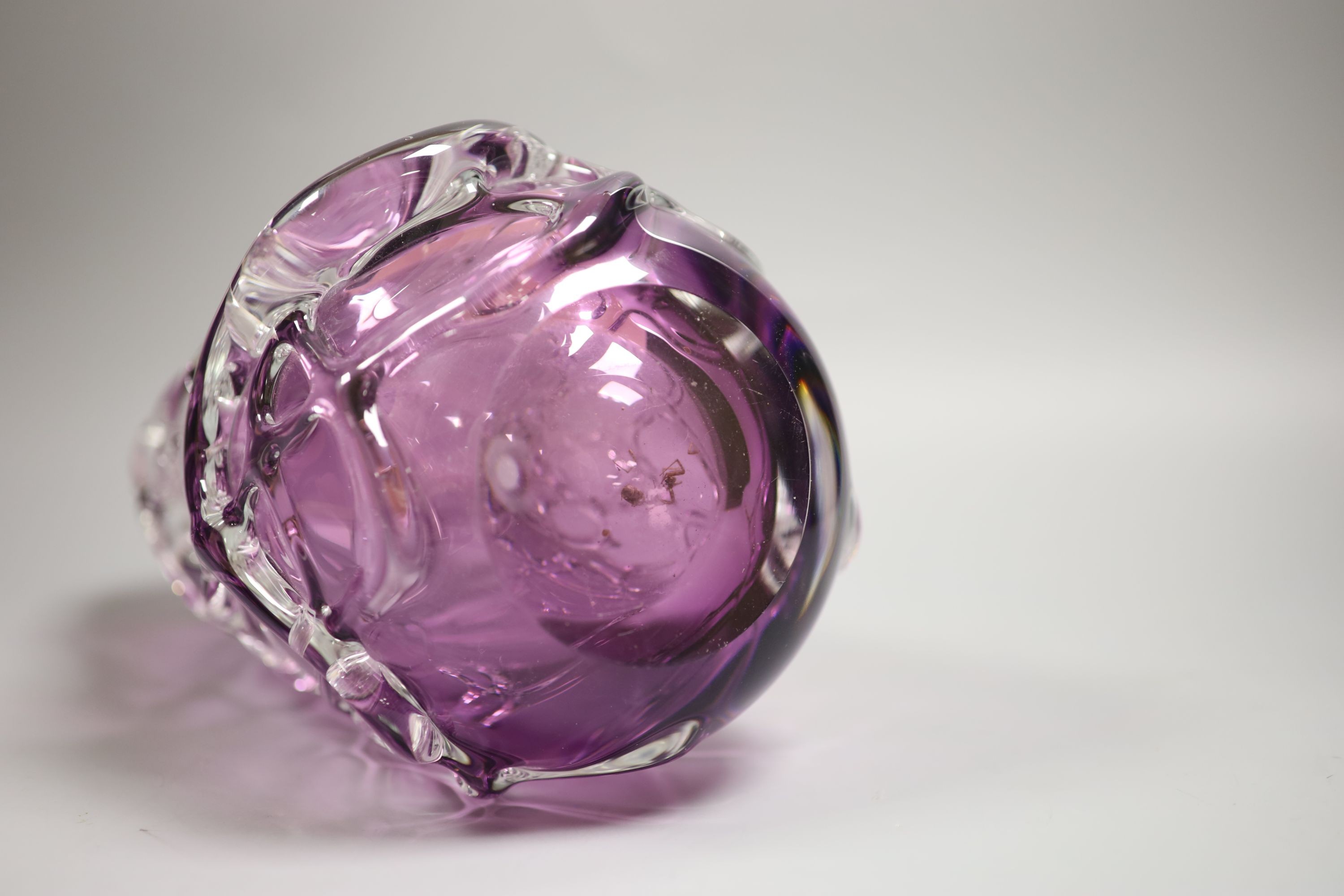 A large amethyst and clear cased glass vase